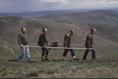 Transporting poles and generator to the summit